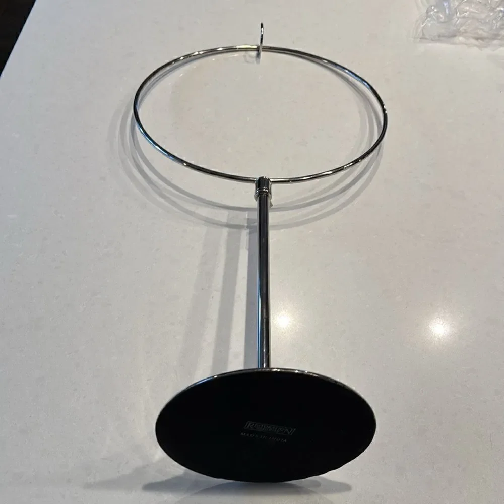 Restoration Hardware wreath hanger, silver can expand height see picture. Nice.